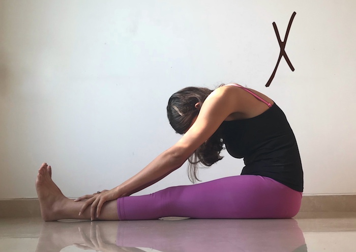 How To Practice Paschimottanasana Yoganama